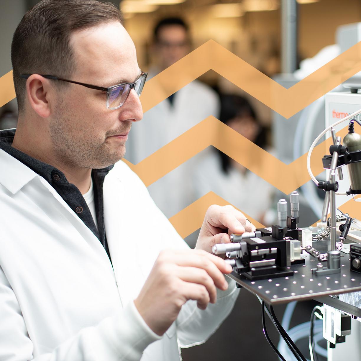 A man working with science equipment