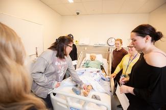Teens in a practical nursing pop-up class